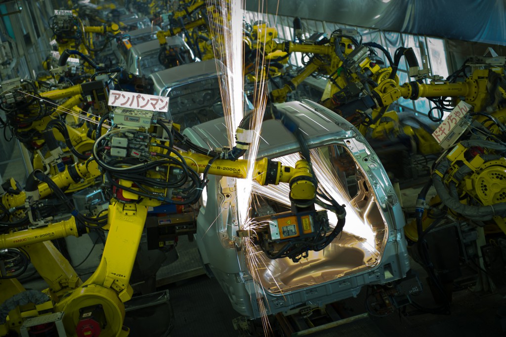 Welding robots in action at Nissan Motor Kyushu Plant.